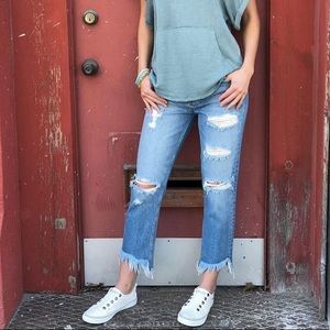 Distressed “mom jeans”